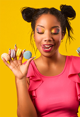 This is a headshot conveying the attitude and style of the Confetti Me Macaron Bakery, shot by Jason Usher